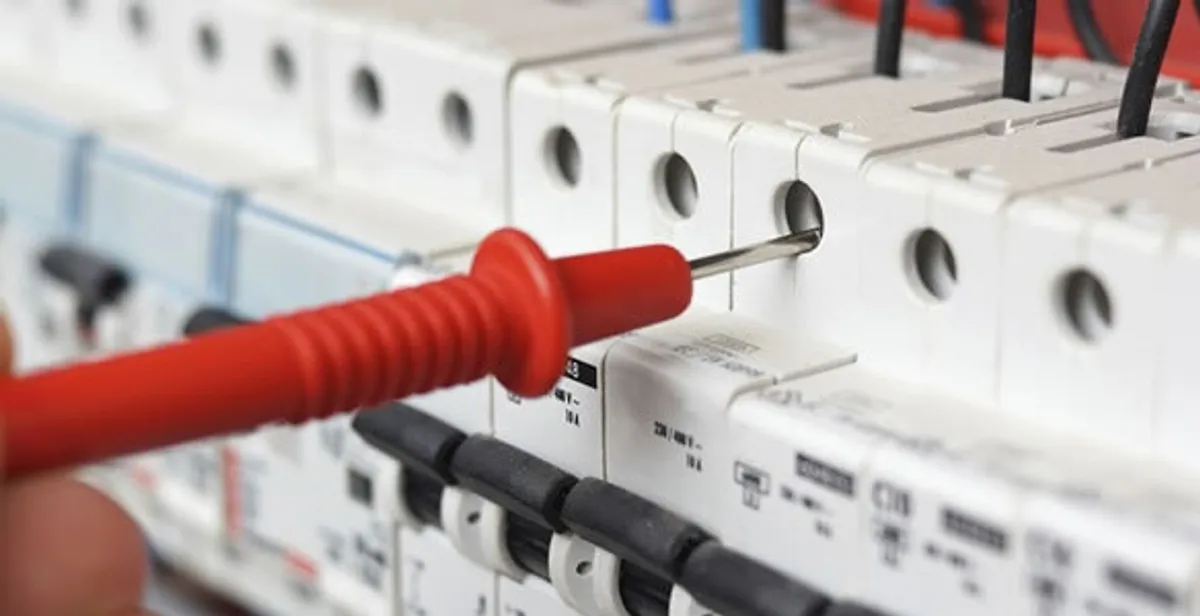 Electrical contractor testing circuit breakers during electrical repair in Buttonwillow, CA