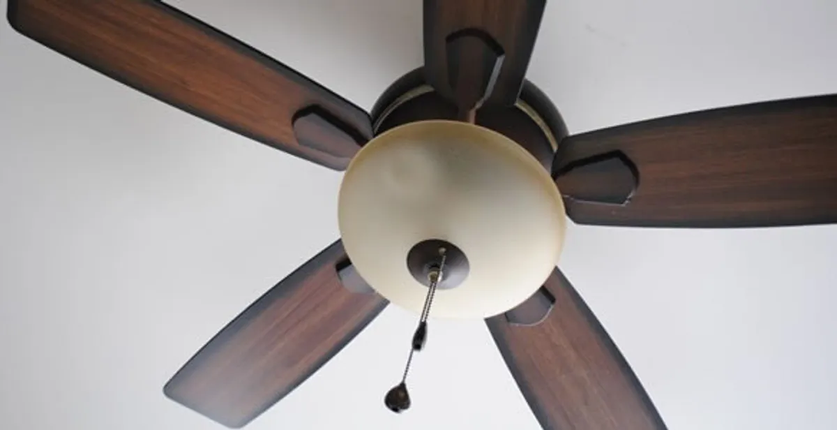 Fully installed ceiling fan with balanced blades and light fixture in Bakersfield, CA