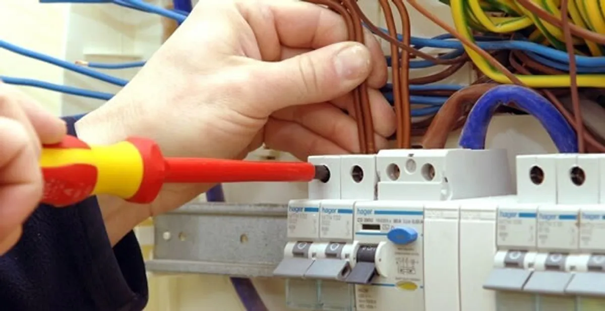 electrician services performing professional electrical panel wiring and connections in Bakersfield, CA