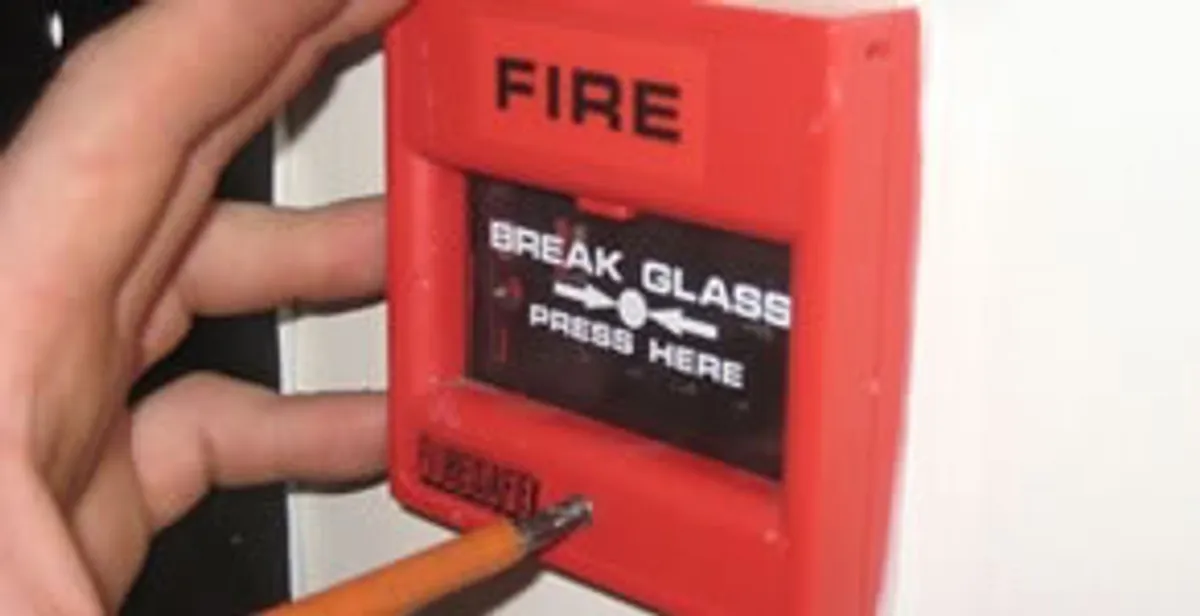fire alarm installation service showing manual fire alarm pull station installed by licensed electricians in Bakersfield, CA