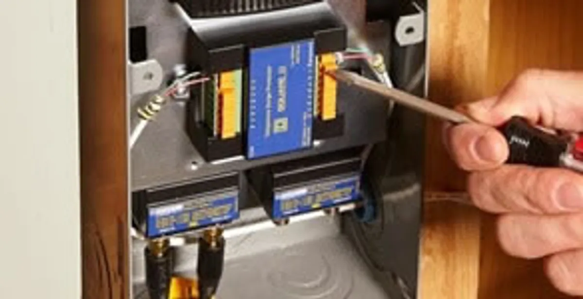 Whole home surge protection device being installed by a licensed electrician to protect electrical systems in Bakersfield, CA